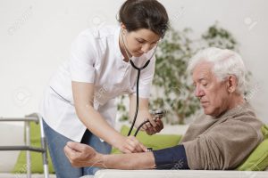 Old Man Checking with Nurse