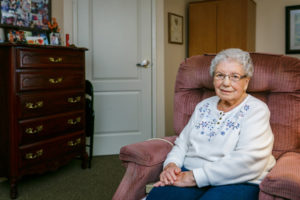 Elderly Woman Sitting in Chair